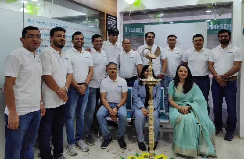 Dr. Mausam Mody with the hospital team during a professional healthcare event