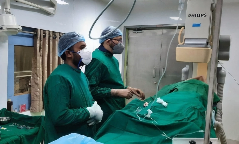 Dr. Priyank Mody performing an interventional cardiology procedure in the cardiac catheterization laboratory